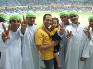 Some of the Pakistani fans in front of us pose with us